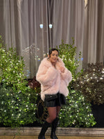 Fourrure à capuche rose