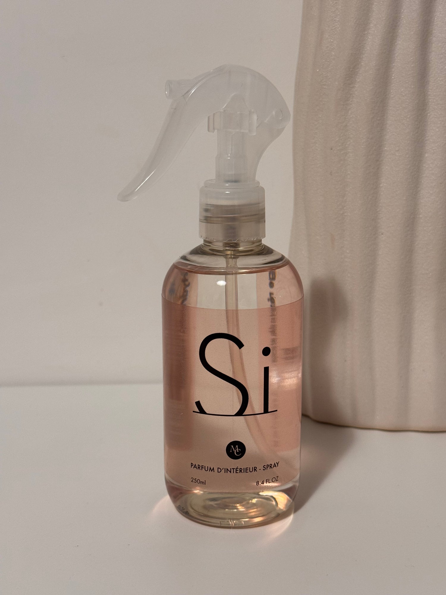 Si